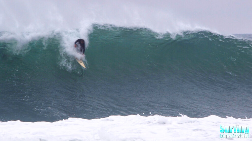 surfing huge waves at blacks beach in la jolla san diego