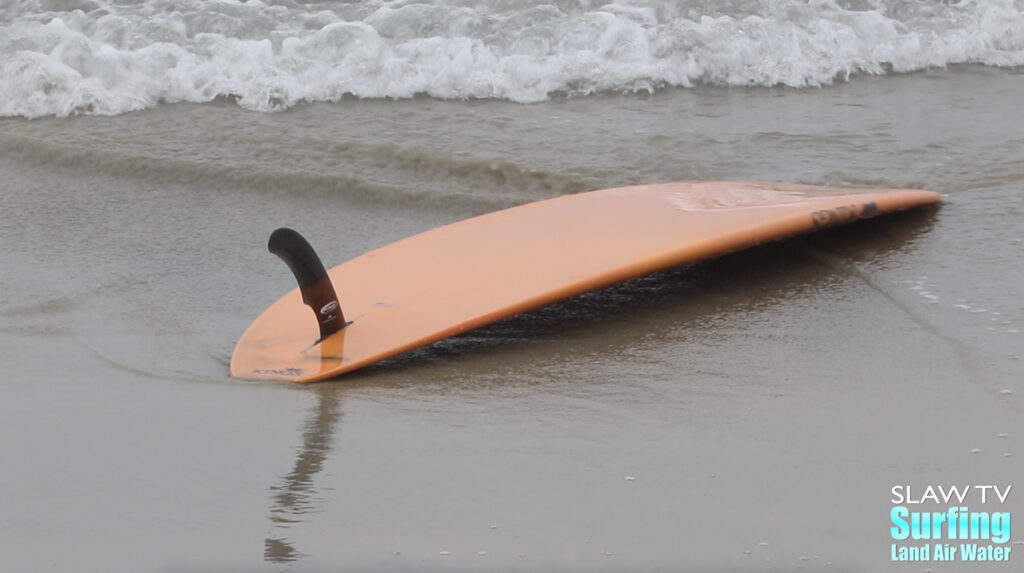 chris blabac surfing longboards at waves in encinitas san diego