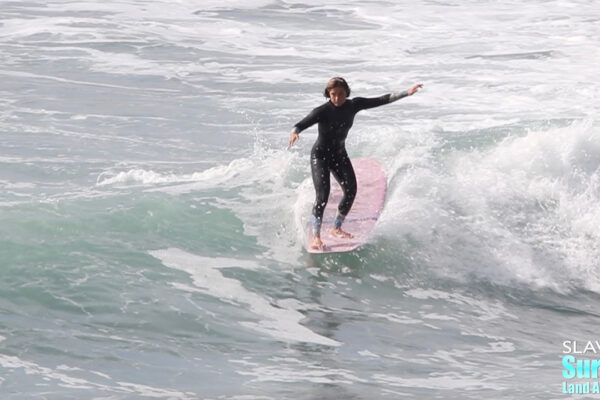 frankie seely surfing longboards at swamis beach in encinitas