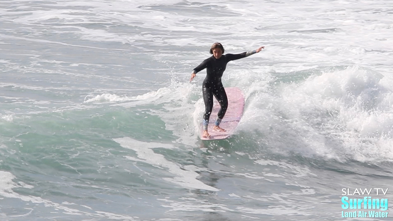 frankie seely surfing longboards at swamis beach in encinitas