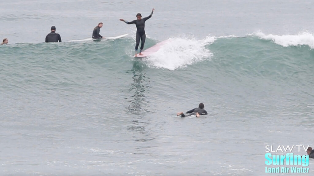 frankie seely surfing longboards at swamis beach in encinitas