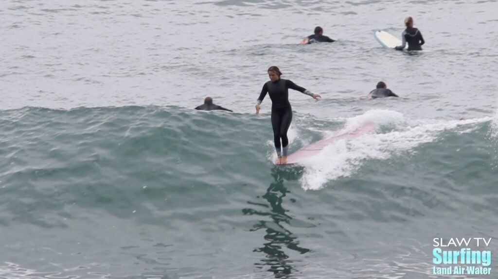 frankie seely surfing longboards at swamis beach in encinitas