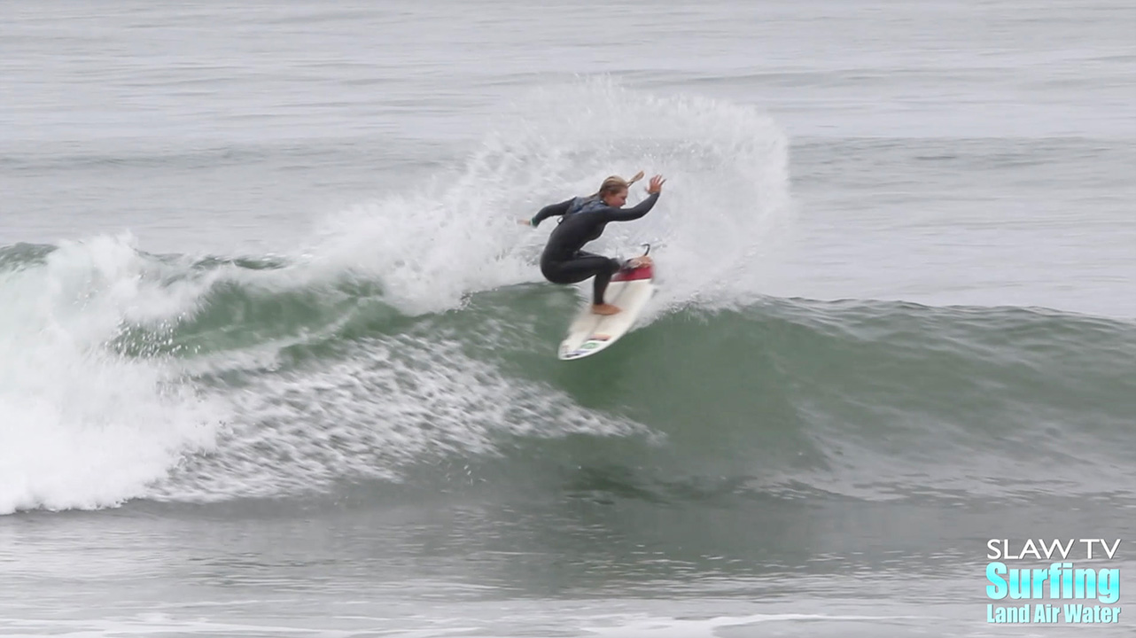 girl groms surfing waves at lowers trestles