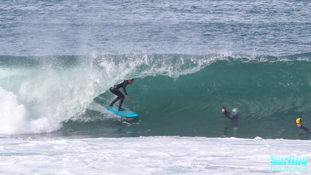 surfing barreling waves at the la jolla reefs in san diego