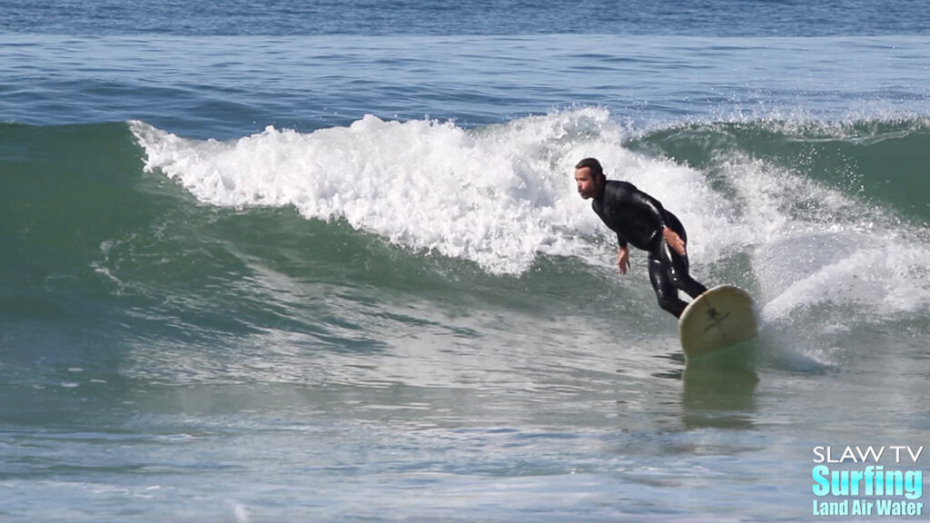 martin grunburg surfing longboards at tourmaline in pacific beach san diego