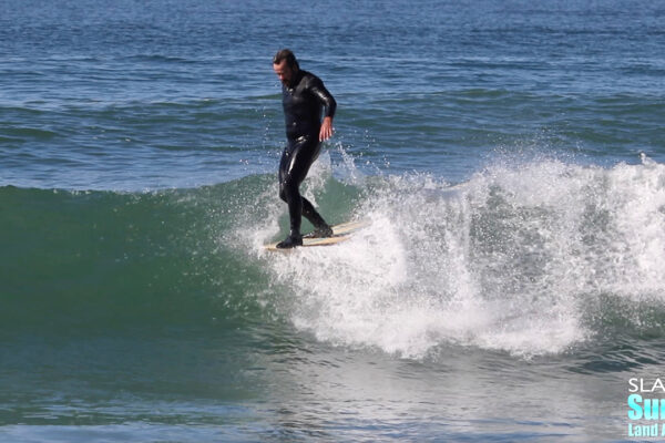 martin grunburg surfing longboards at tourmaline in pacific beach san diego