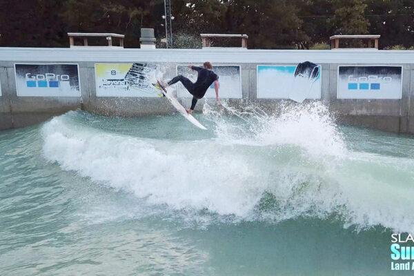 seager surfing team boosting airs at waco surf wave pool in texas