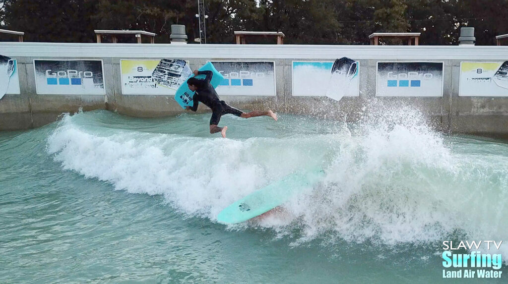 seager surfing team boosting airs at waco surf wave pool in texas