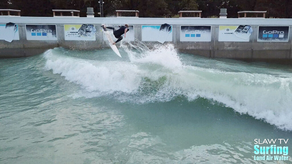 seager surfing team boosting airs at waco surf wave pool in texas