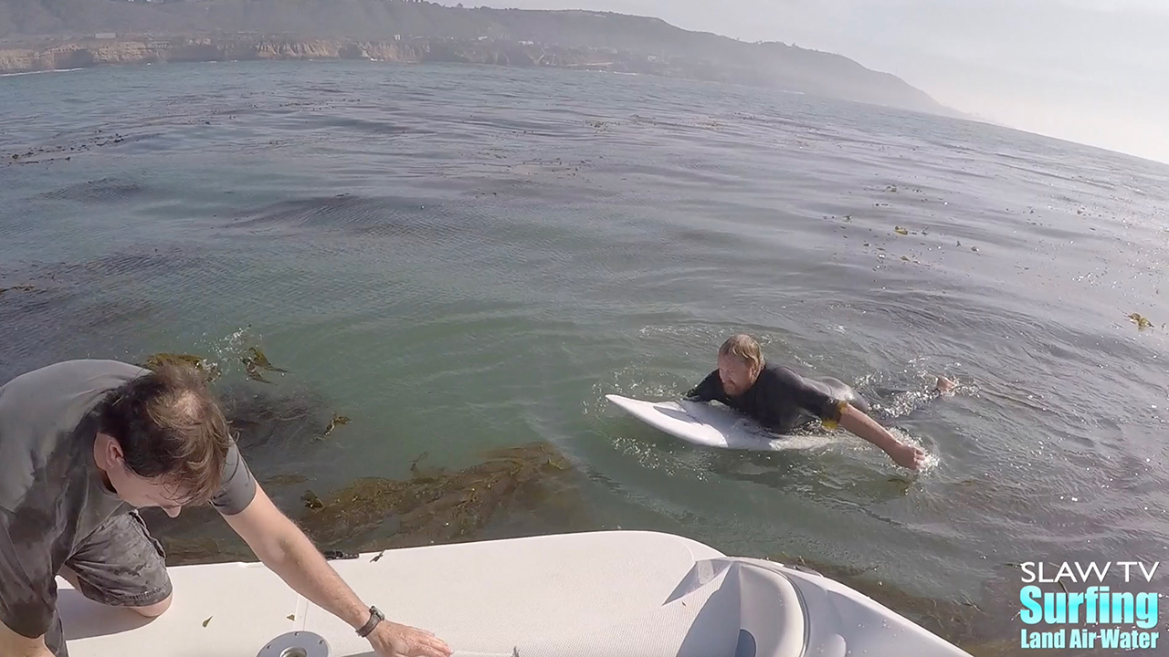 surfing sunset cliffs by boat for water photos in san diego