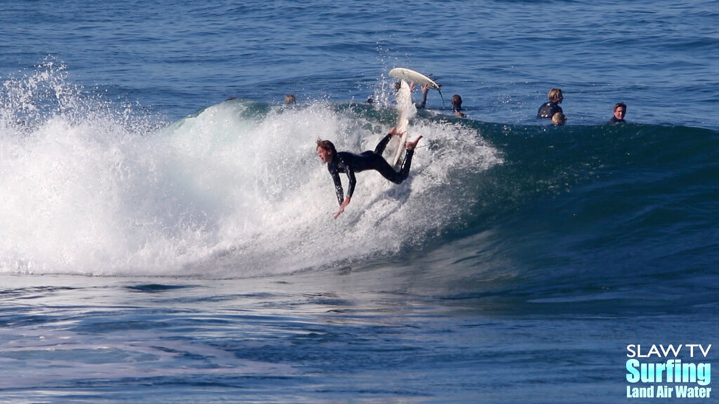 surfing wipeout at la jolla reefs in san diego