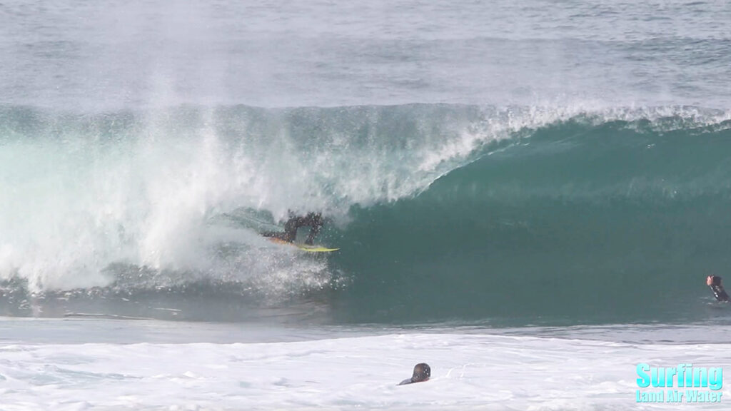 surfing barreling waves at the la jolla reefs in san diego