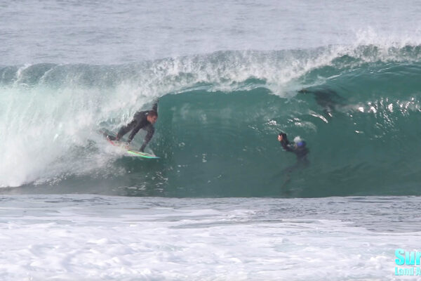 surfing barreling waves at the la jolla reefs in san diego