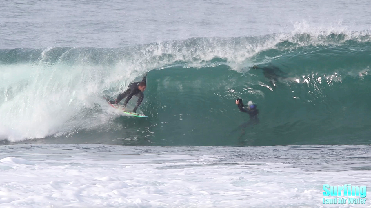 surfing barreling waves at the la jolla reefs in san diego