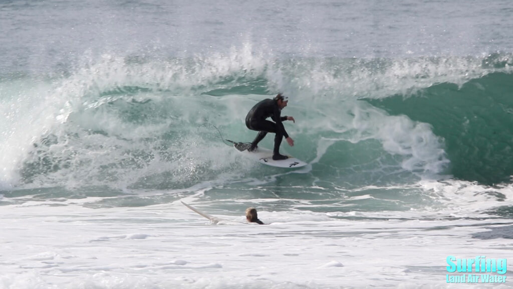 surfing barreling waves at the la jolla reefs in san diego