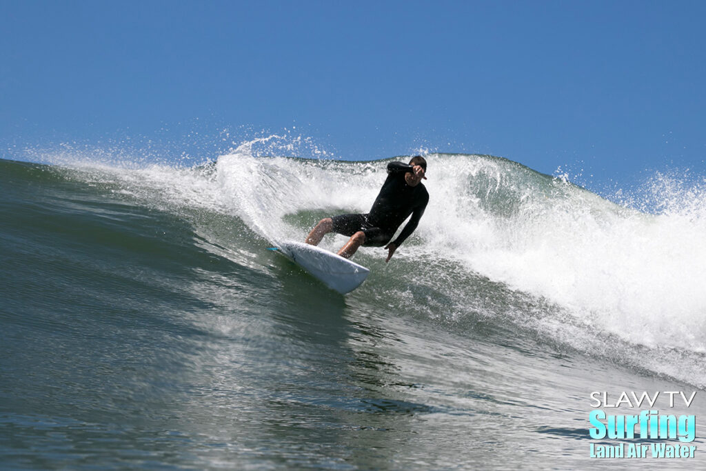 surfing a san diego reef break on 07-24-2018