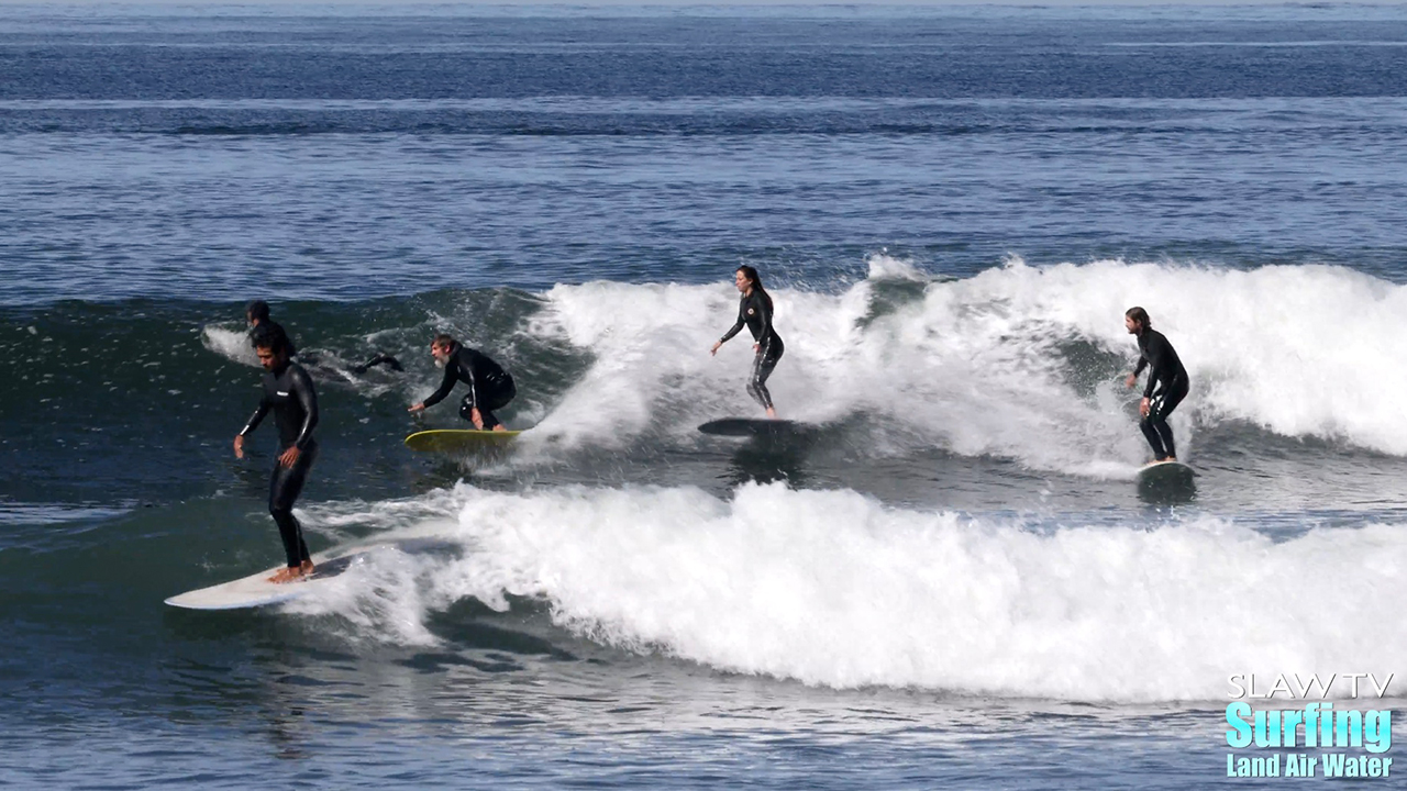 surfing cardiff reef waves with longboards in encinitas