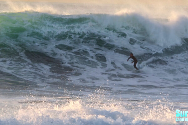 surfing big waves in california at la jolla reefs in san diego