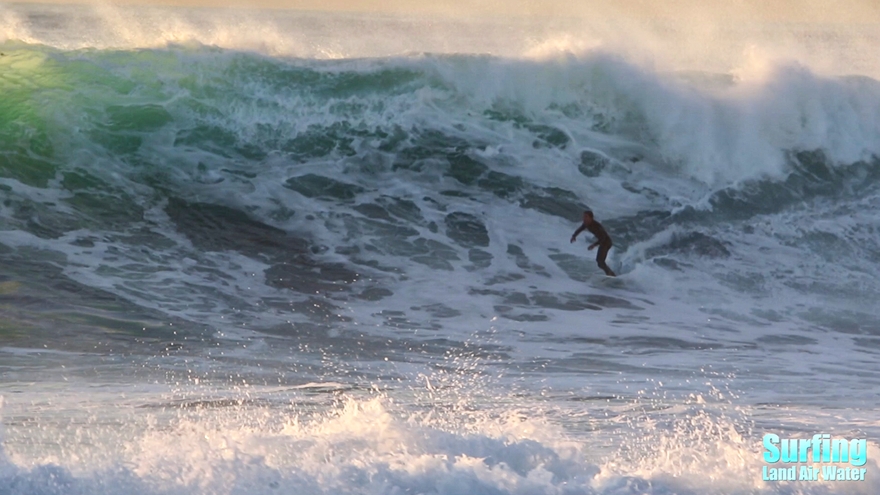 surfing big waves in california at la jolla reefs in san diego