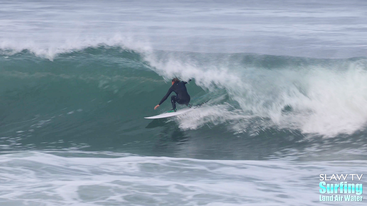 surfing barreling waves in san diego california