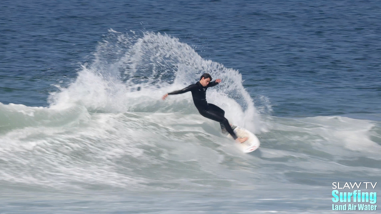 surfers in pacific beach riding great waves