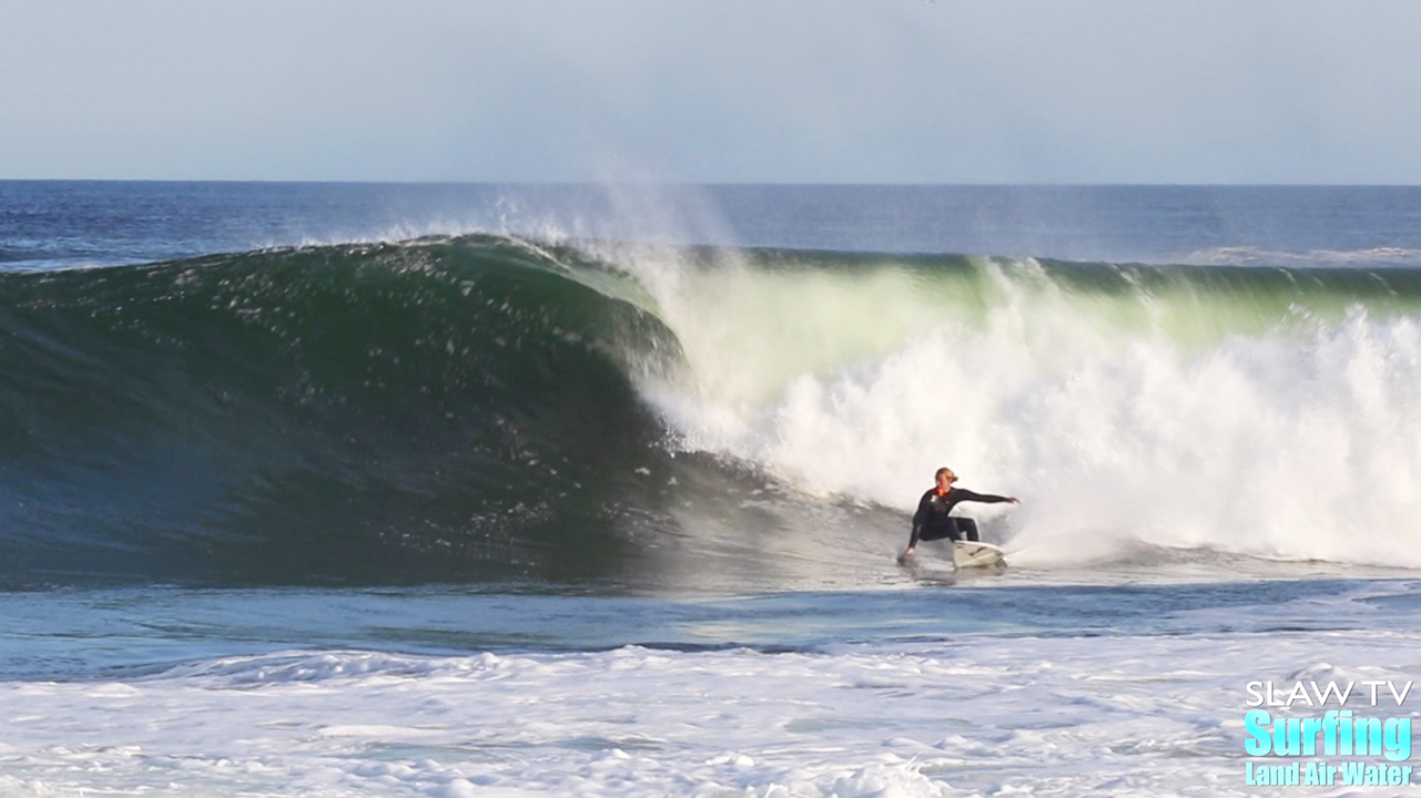 cole deveney surfing big waves during hurricane sam on jersey shore