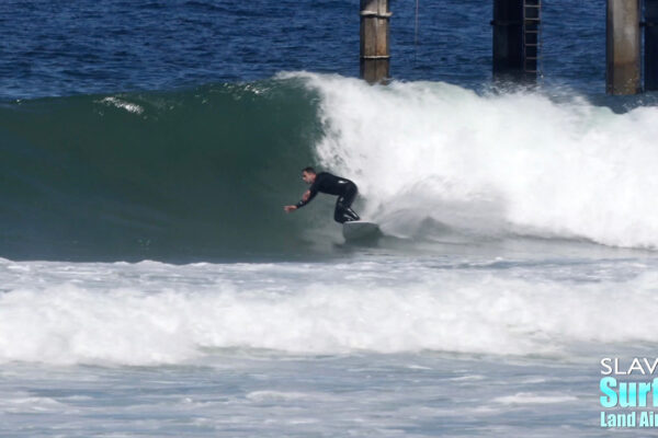 surfing waves at scripps pier in la jolla san diego