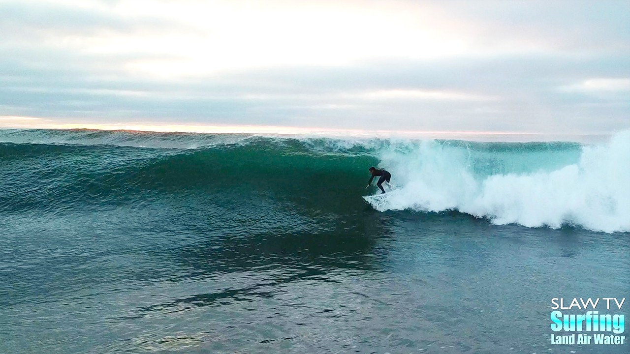 surfing great waves in san diego california and filming with a drone