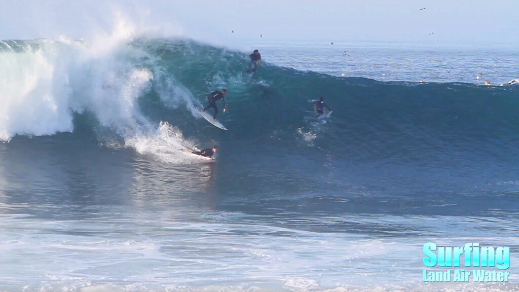 surfing huge wedge newport beach during hurricane marie