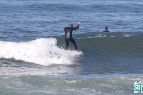 surfing tourmaline with longboards in pacific beach san diego