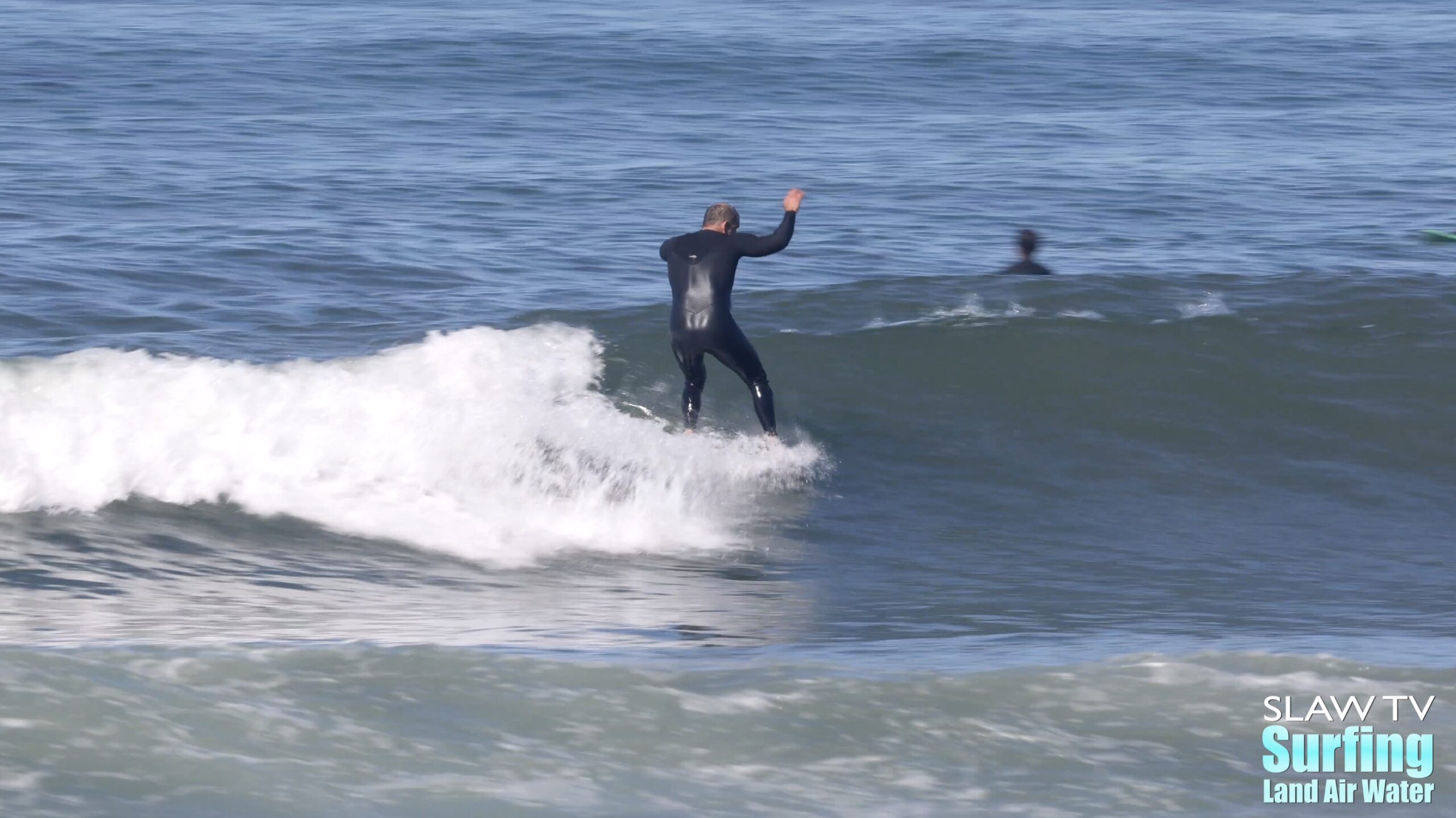 surfing tourmaline with longboards in pacific beach san diego