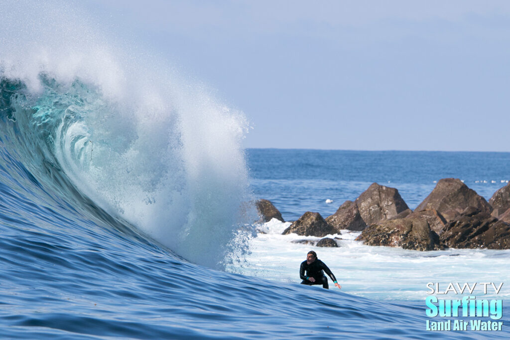 surfing big waves at todos santos in baja mexico