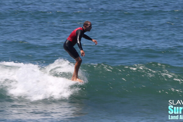 richie cravey surfing in jen smith aloha longboarding surf contest at tourmaline beach in san diego