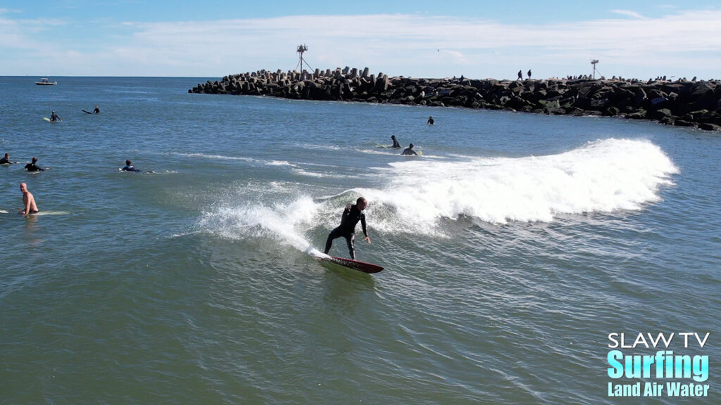 manasquan inlet surfing photos and videos with aerial drone on 09-24-2022