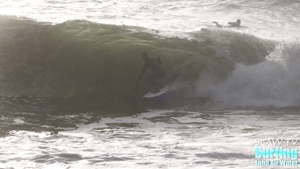 surfing a novelty sandbar on the california coastline with barreling waves