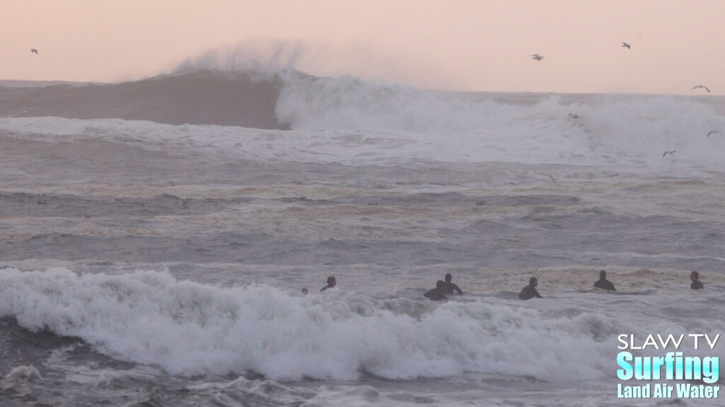 surfing a california sandbar wave that has hollow barrels