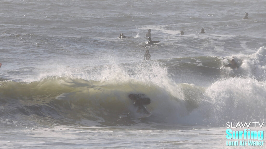 surfing california novelty barreling sandbar during winter storm