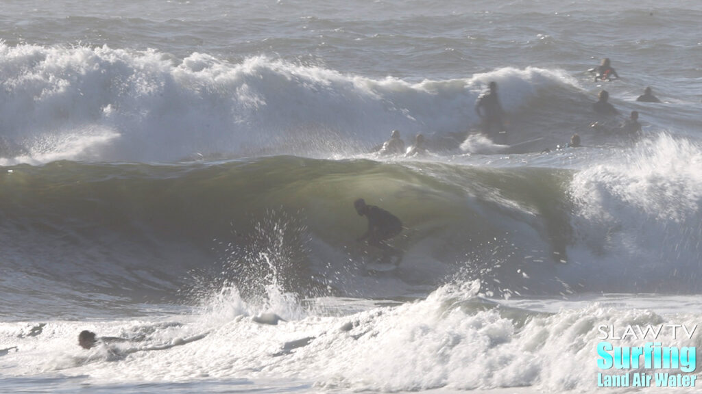 surfing california novelty barreling sandbar during winter storm