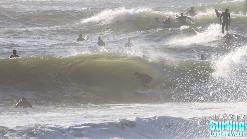 surfing california novelty barreling sandbar during winter storm