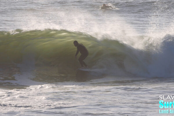 surfing california novelty barreling sandbar during winter storm