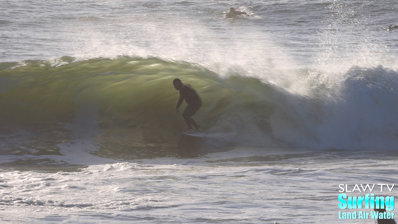 surfing california novelty barreling sandbar during winter storm